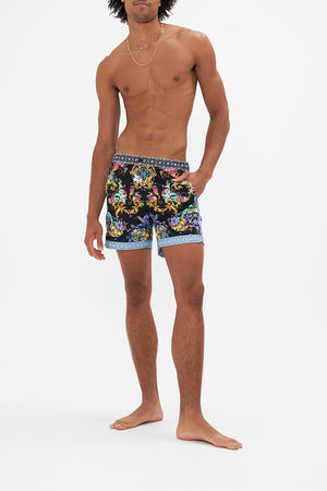 Front view of model wearing Hotel Franks By CAMILLA floral men swim shorts in Meet Me In Marchesa print