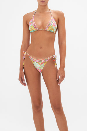 Detail view of model wearing CAMILLA reversible bikini top in An Italian Welcome print