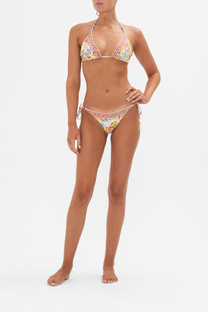 Crop view of model wearing CAMILLA reversible bikini top in An Italian Welcome print
