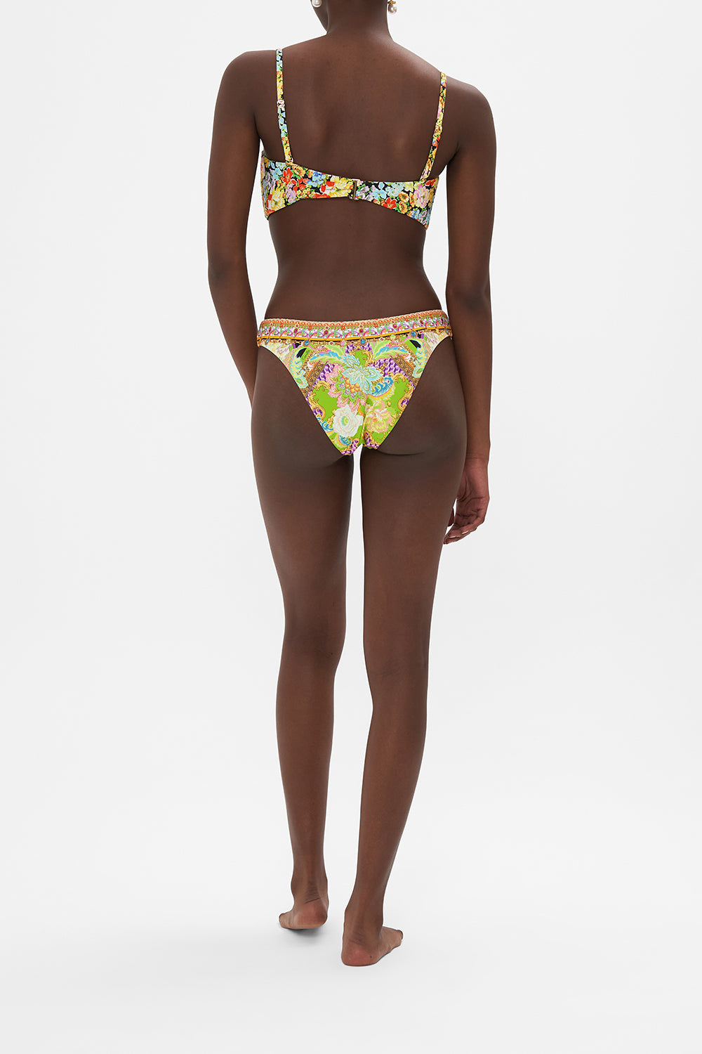 Back view of model wearing CAMILLA swimwear printed bikini bottoms in Sundowners in Sicily print
