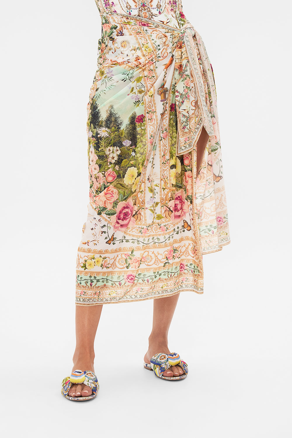 Crop view of model wearing CAMILLA resortwear long sarong in Renaissance Romance print
