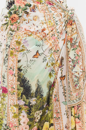 Detail view of model wearing CAMILLA resortwear long sarong in Renaissance Romance print