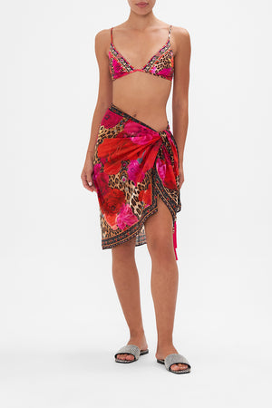 Front view of model wearing CAMILLA resortwear short sarong in Heart Like Wildflower print