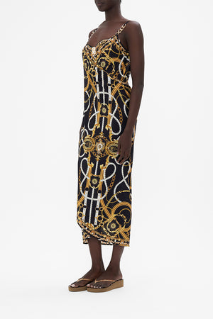 Side view of model wearing CAMILLA resortwear sarong dress in Coast To Coast print