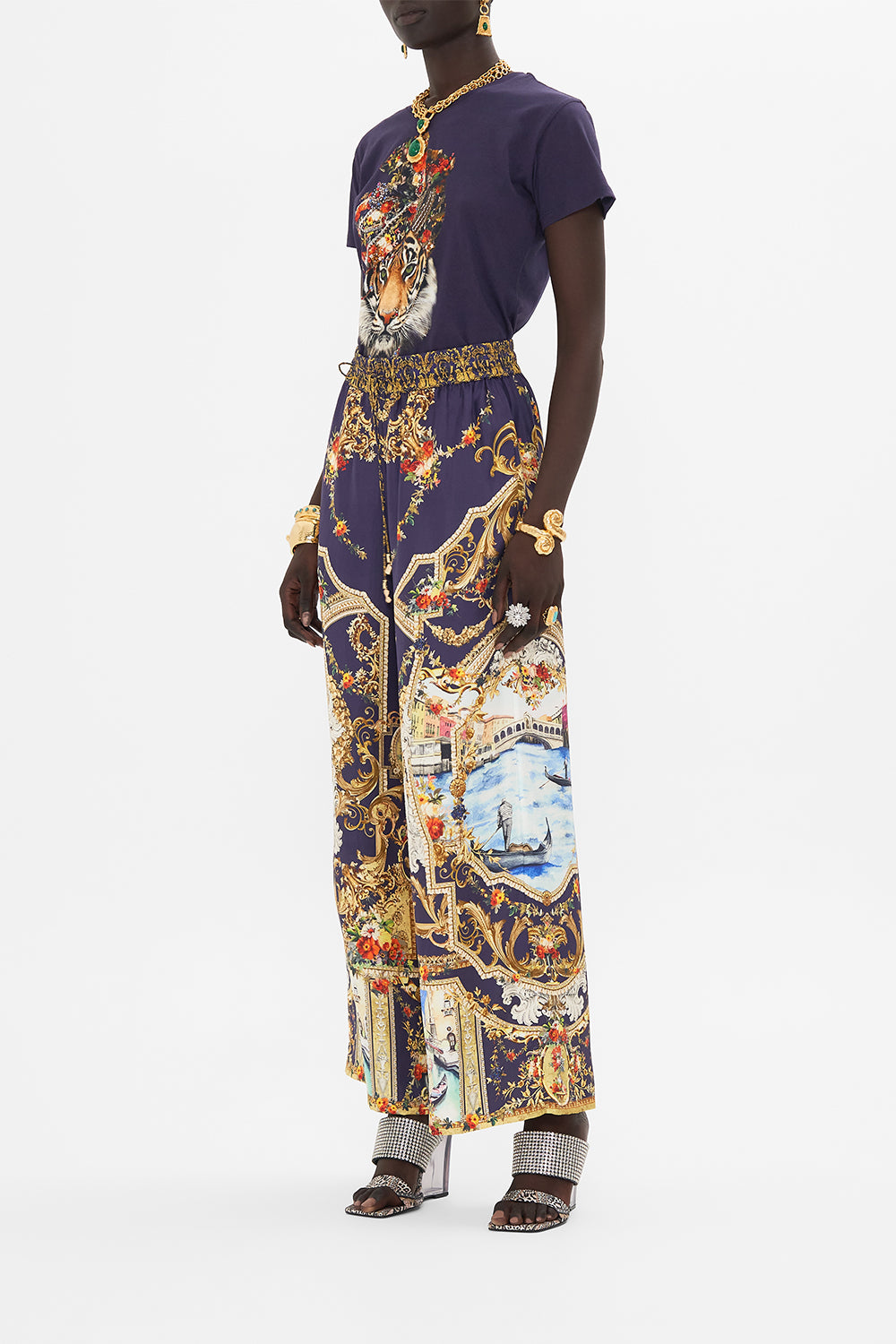 Side view of model wearing CAMILLA silk pants in Venice Vignette print