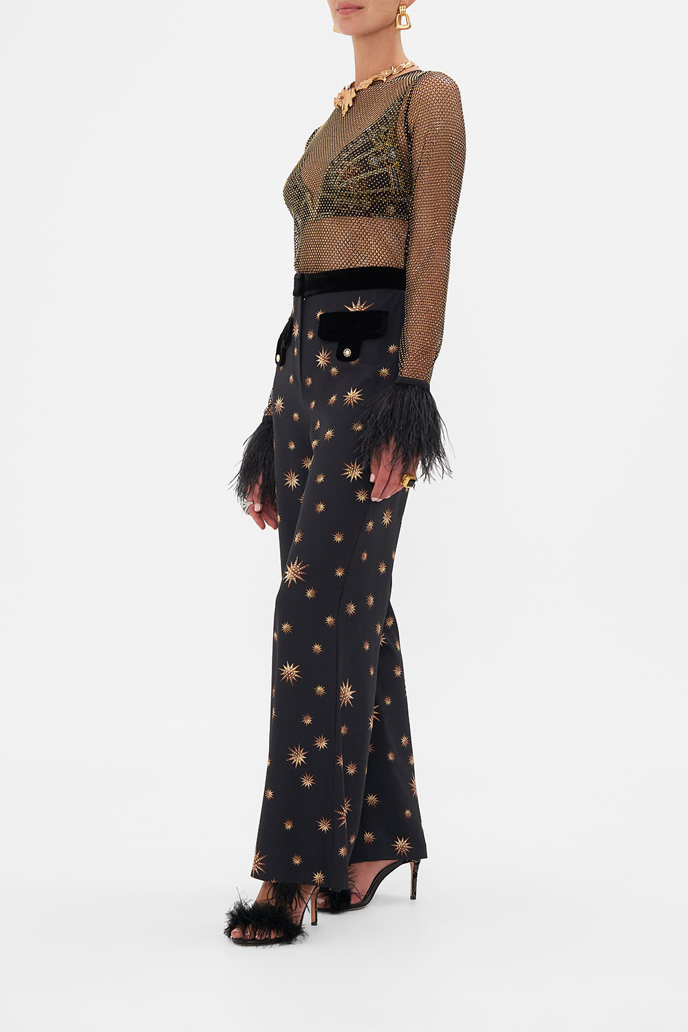 Side view of model wearing CAMILLAdesigner mesh top in Soul Of A Star Gazer print 