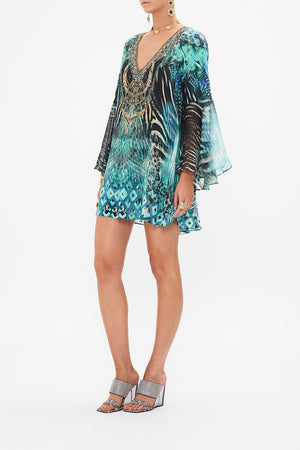 Side view of model wearing CAMILLA silk mini dress in Azure Allure print