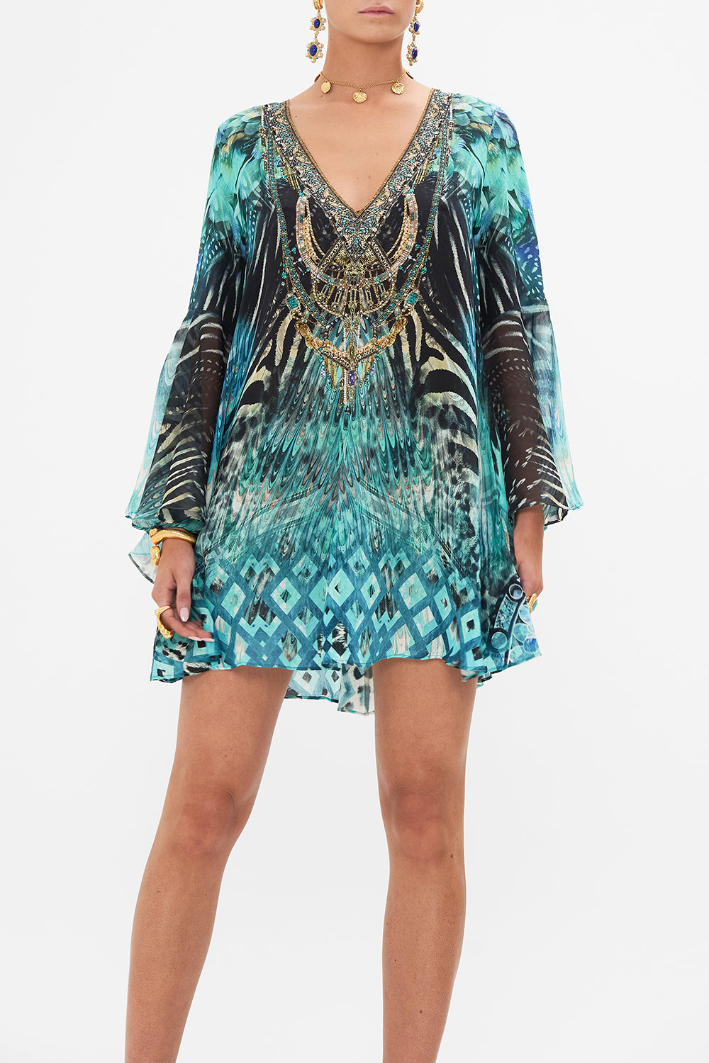 Crop view of model wearing CAMILLA silk mini dress in Azure Allure print