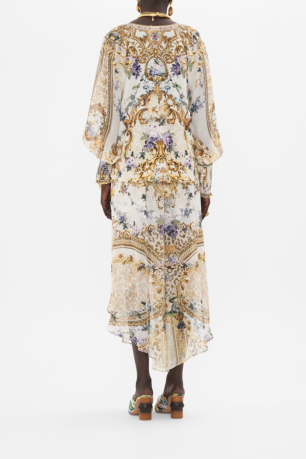 Back view of model wearing CAMILLA silk blouse in Palazzo Playdate print 