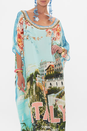 Crop view of model wearing CAMILLA silk kaftan in From Sorrento With Love print