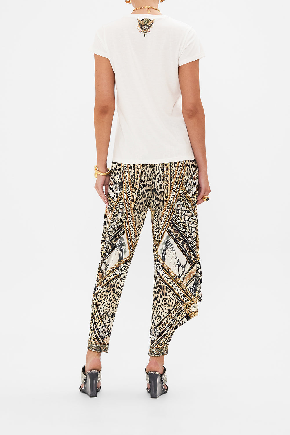 Back view of model wearing CAMILLA animal print t shirt in Mosaic Muse 