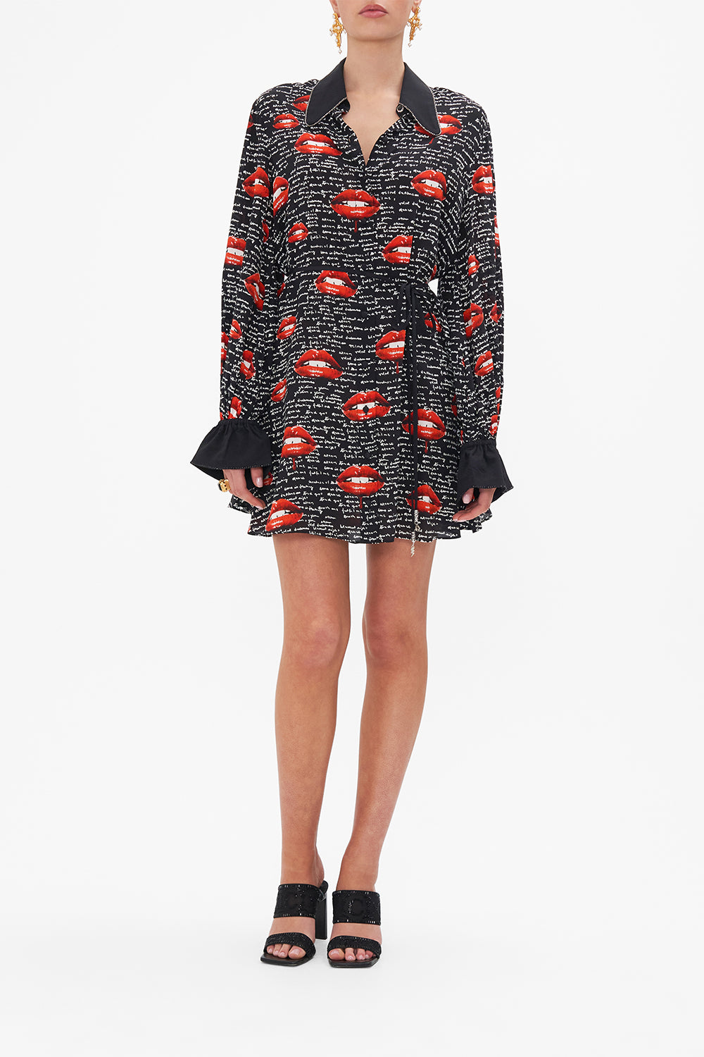 Front view of model wearing CAMILLA black silk shirt dress in Chaos Magic print 