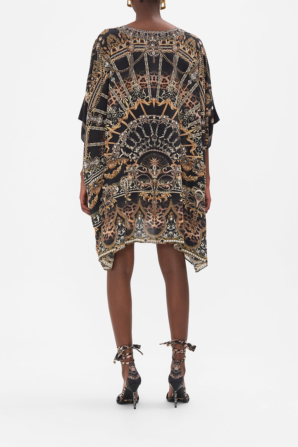 Back view of model wearing CAMILLA siilk kaftan in masked At Moonlight print