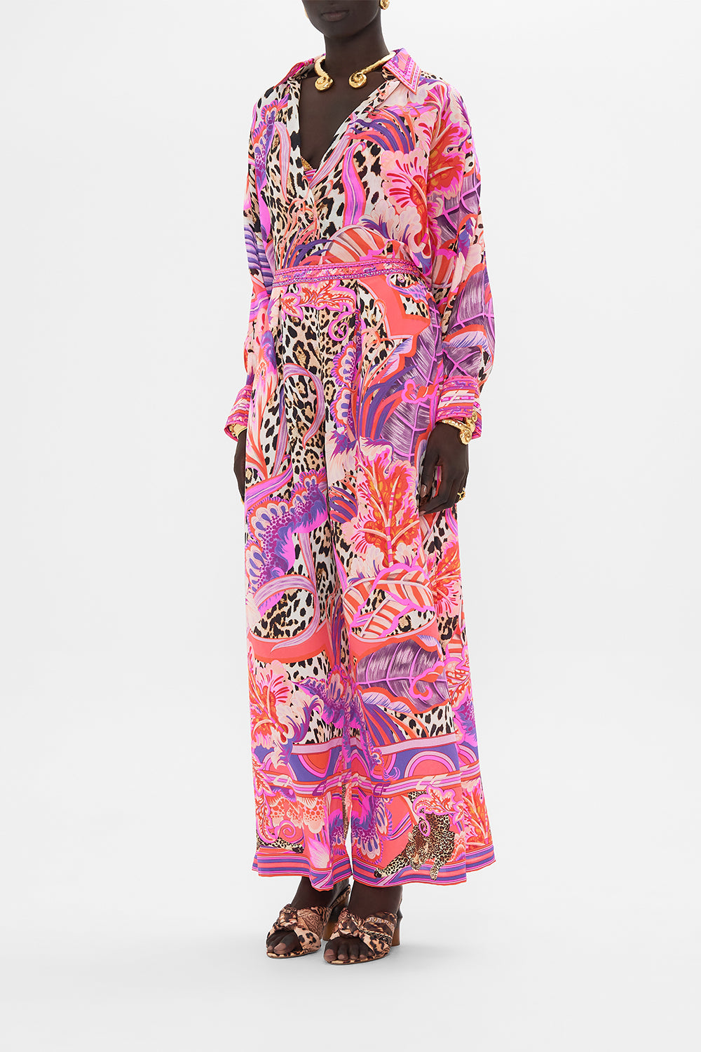 Side view of model wwearing CAMILLA silk pants in Viola Vintage print 