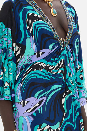 Detail view of model wearing CAMILLA jersey dress in Vividly Venice print 