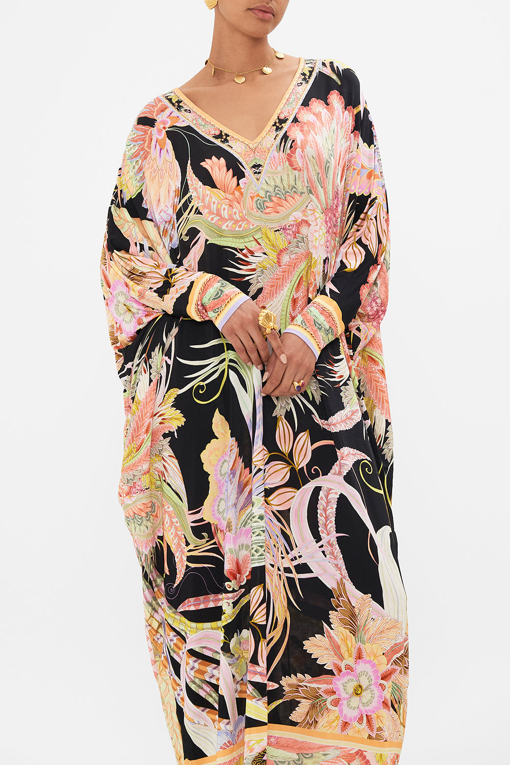 Crop view of model wearing CAMILLA designer jersey kaftan in Lady of The Moon print