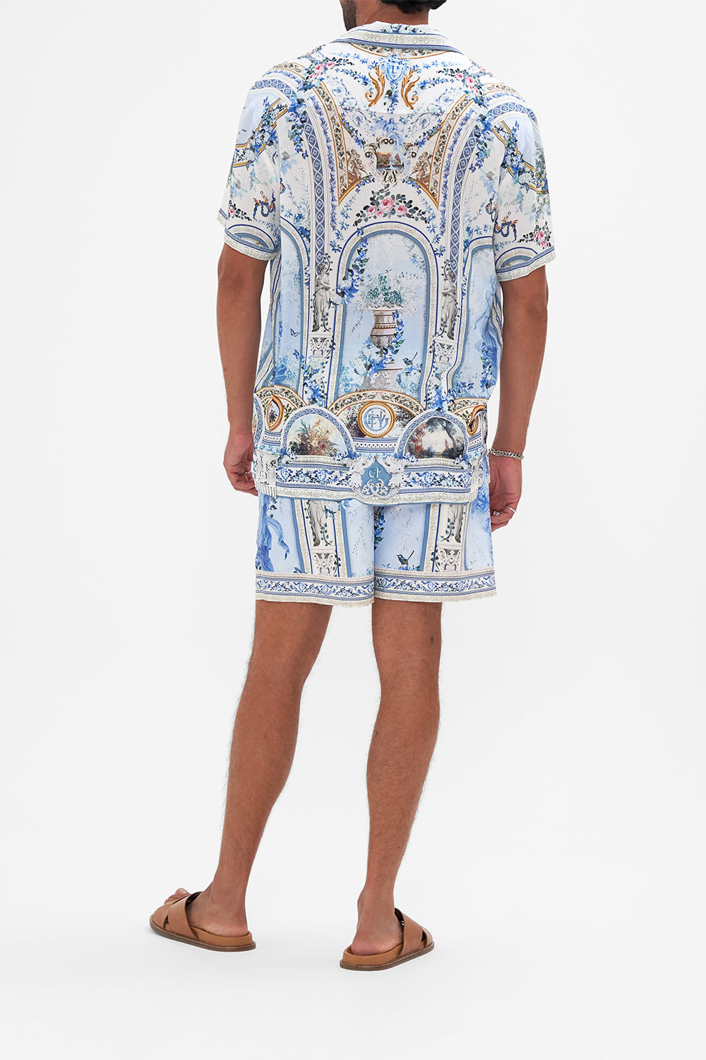 Back view of model wearing HOTEL FRANKS BY CAMILLA collared shirt in Season of the Siren print