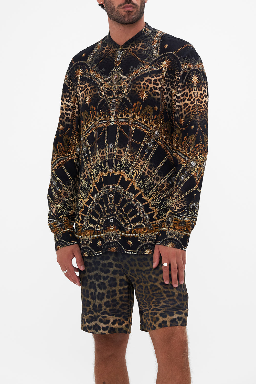 Crop view of model wearing Hotel Franks By CAMILLA mens long sleeve shirt in Masked At Moonlight print 