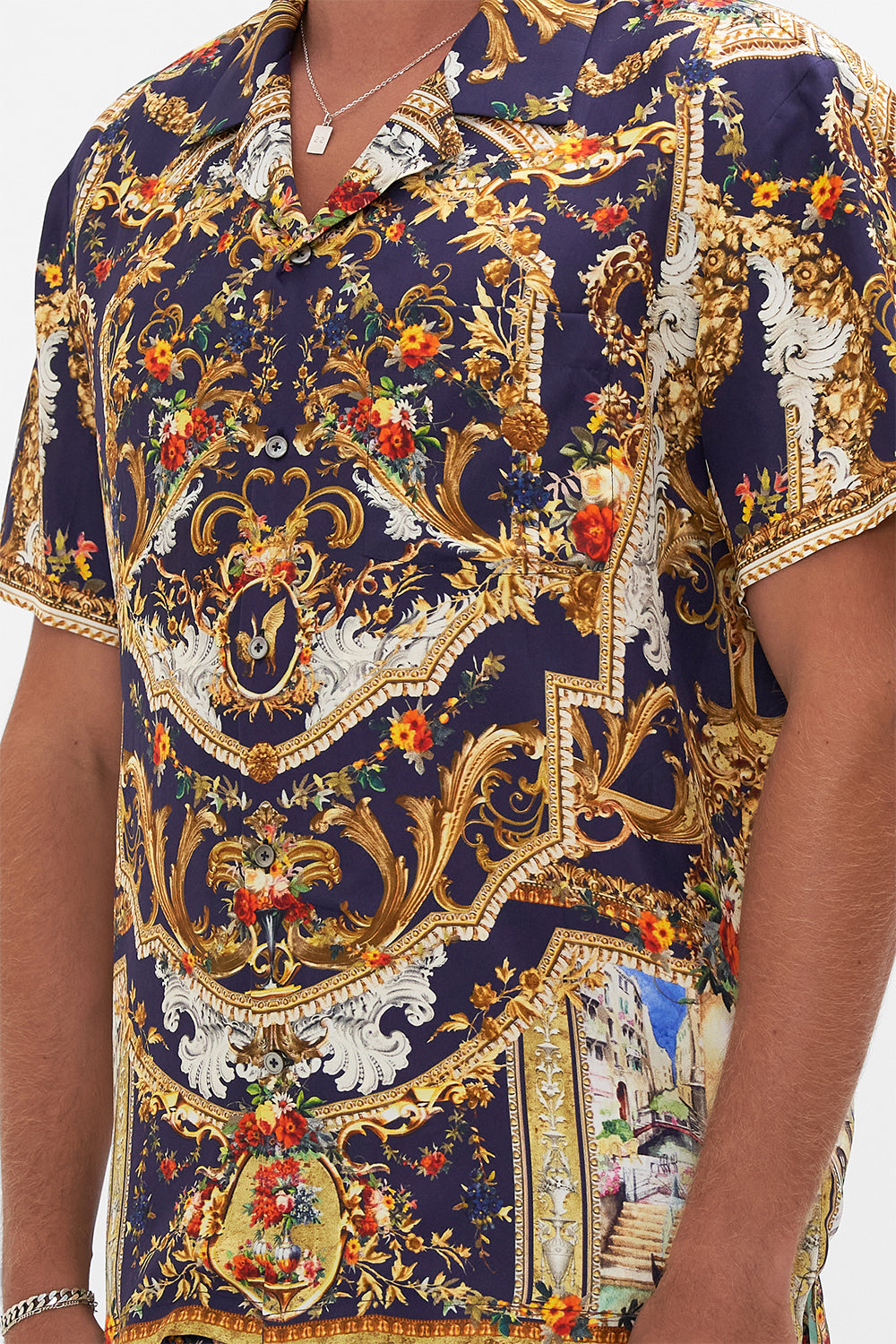 Detail view of model wearing Hotel Franks By CAMILLA mens short sleeve camp collared shirt in  Venice Vignette print 