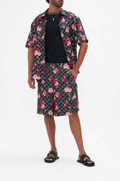 Front view of model wearing Hotel Franks By CAMILLA mens walkshort in Reservation For Love print 