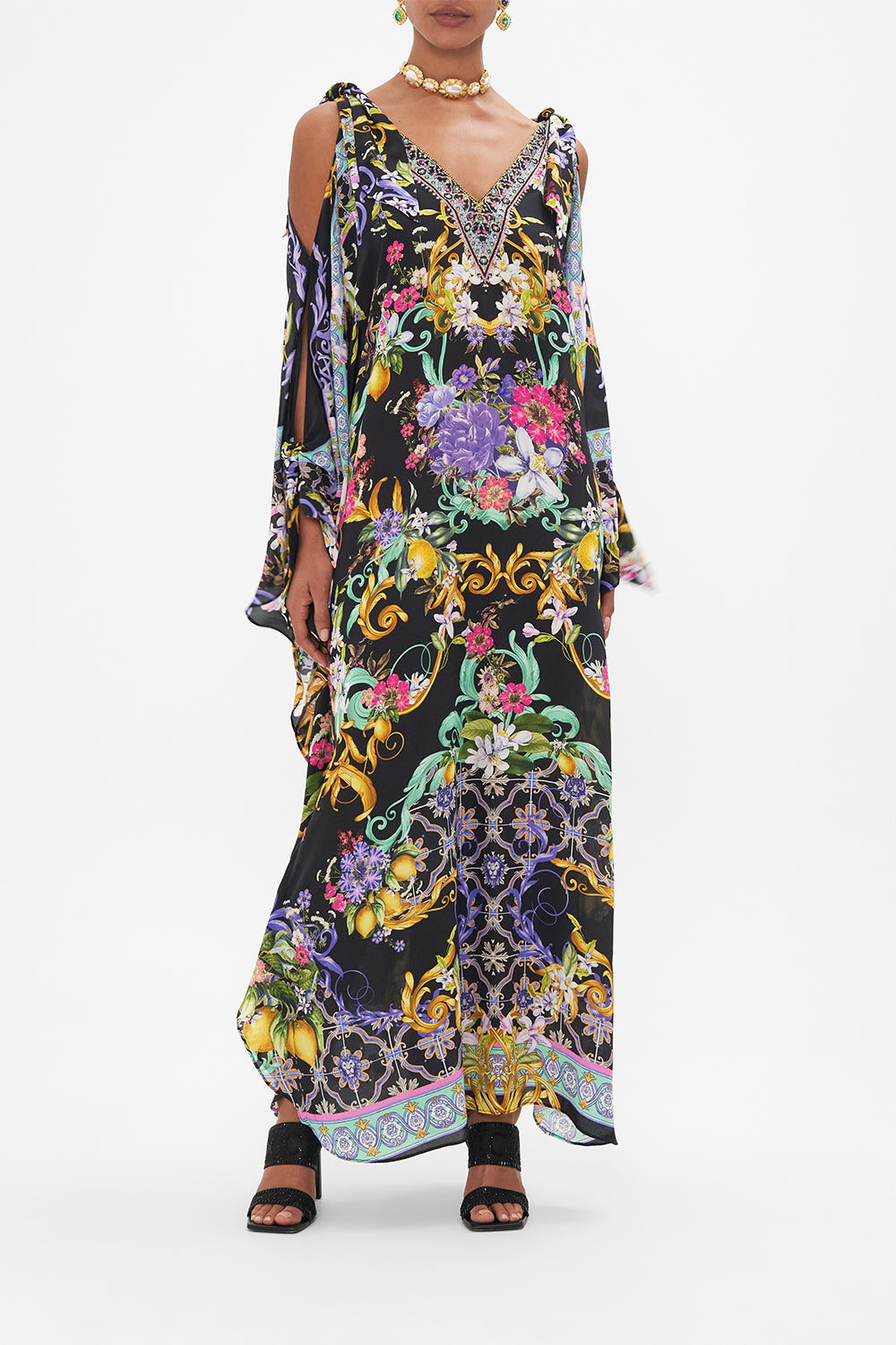 Front view of model wearing CAMILLA black floral silk kaftan in Meet Me In Marchesa print