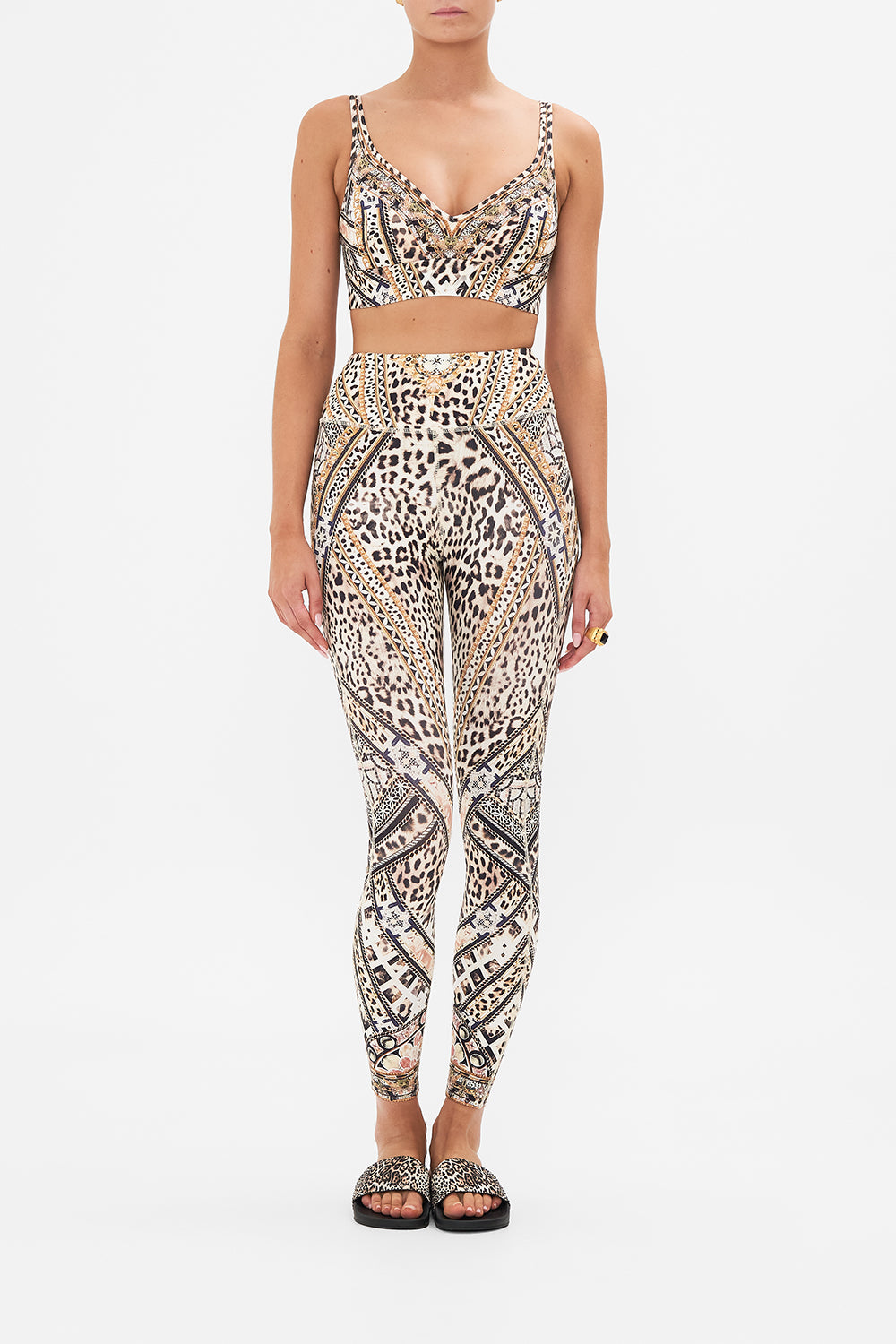 Front view of model wearing CAMILLA animal print active crop top in Mosaic Muse