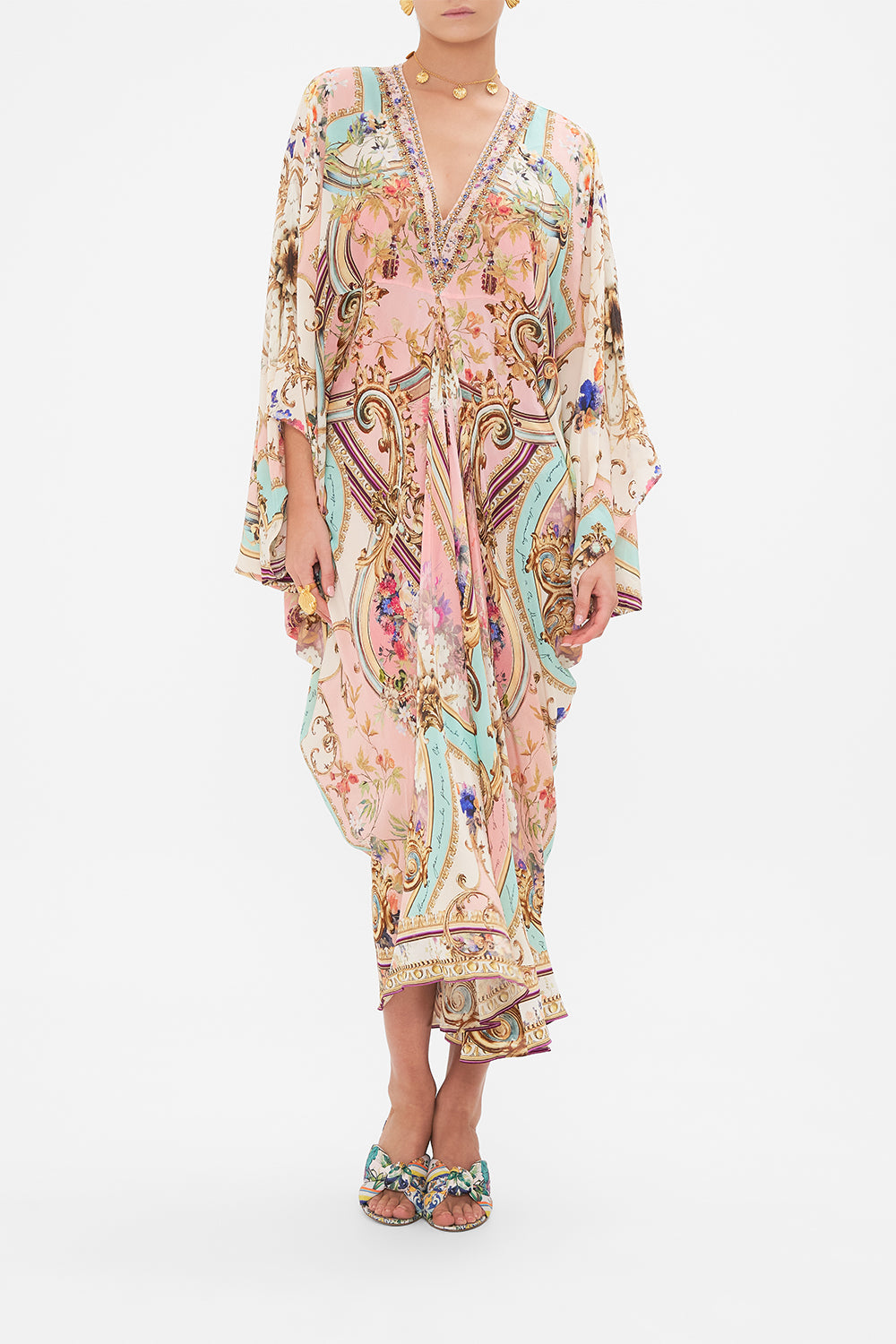 Front view of model wearing CAMILLA long silk kaftan in Letters from the Pink Room print
