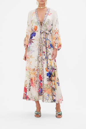 Front view of model wearing CAMILLA silk long kimono layer in Friends with Frescos print