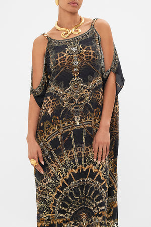 Crop view of model wearing CAMILLA silk kaftan with hardware in Masked  at Moonlight print