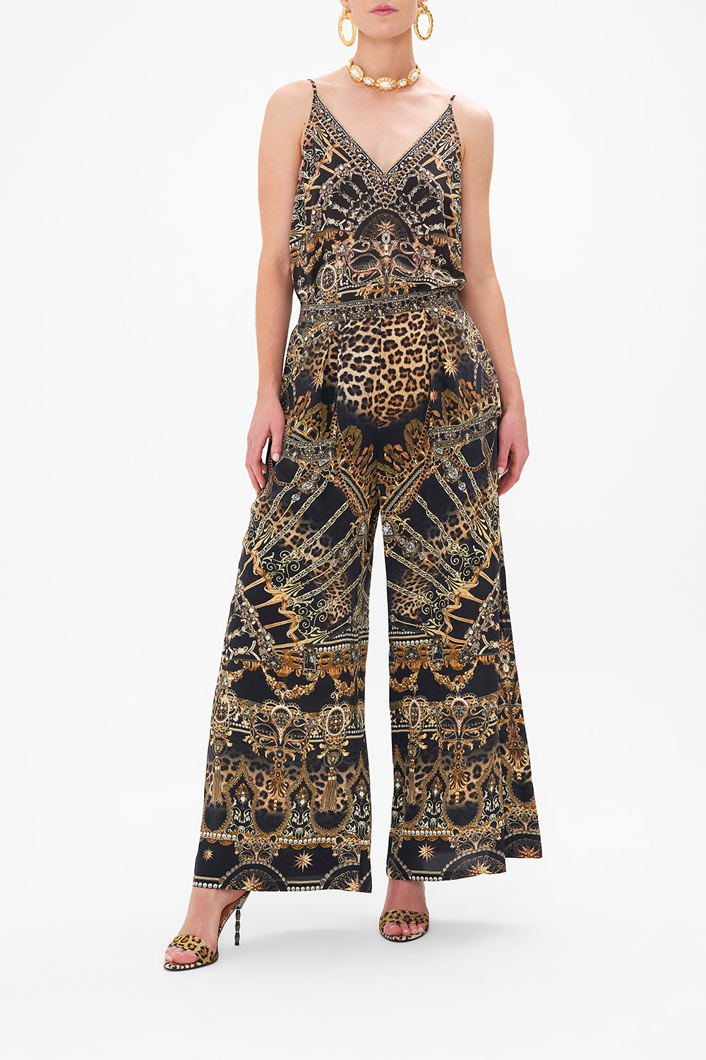 Front view of model wearing CAMILLA silk palazzo pants in Masked At Moonlight print