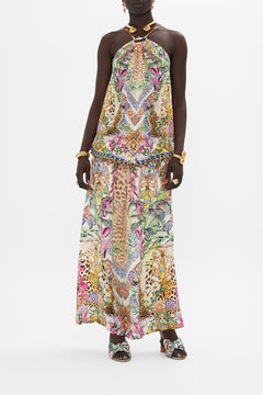 Front view of model wearing CAMILLA floral halter top in Flowers Of Neptune print