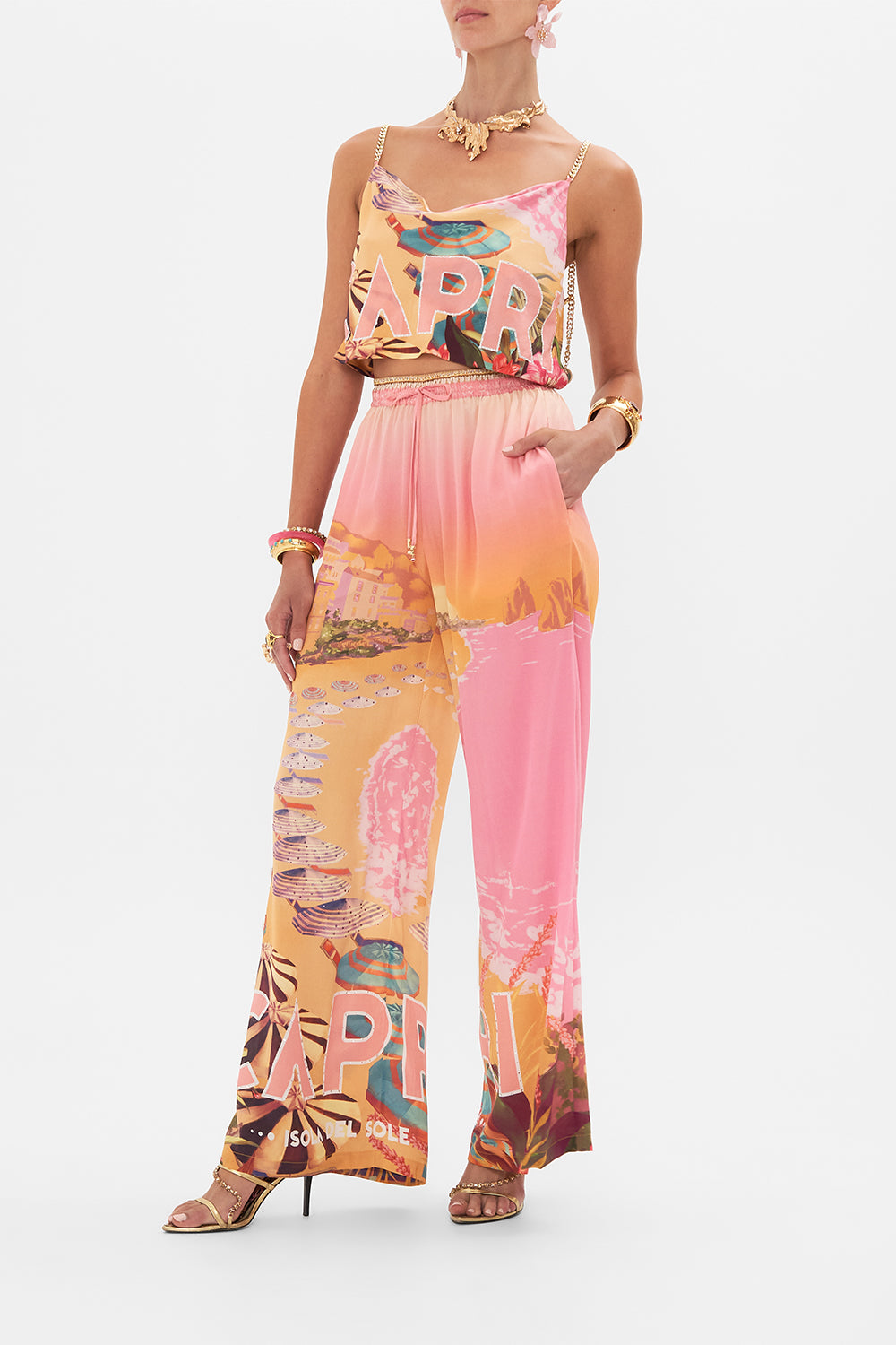 Side view of model wearing CAMILLA silk lounge pant in Capri Me print