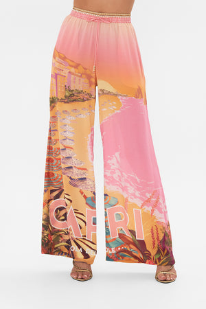 Crop view of model wearing CAMILLA silk lounge pant in Capri Me print