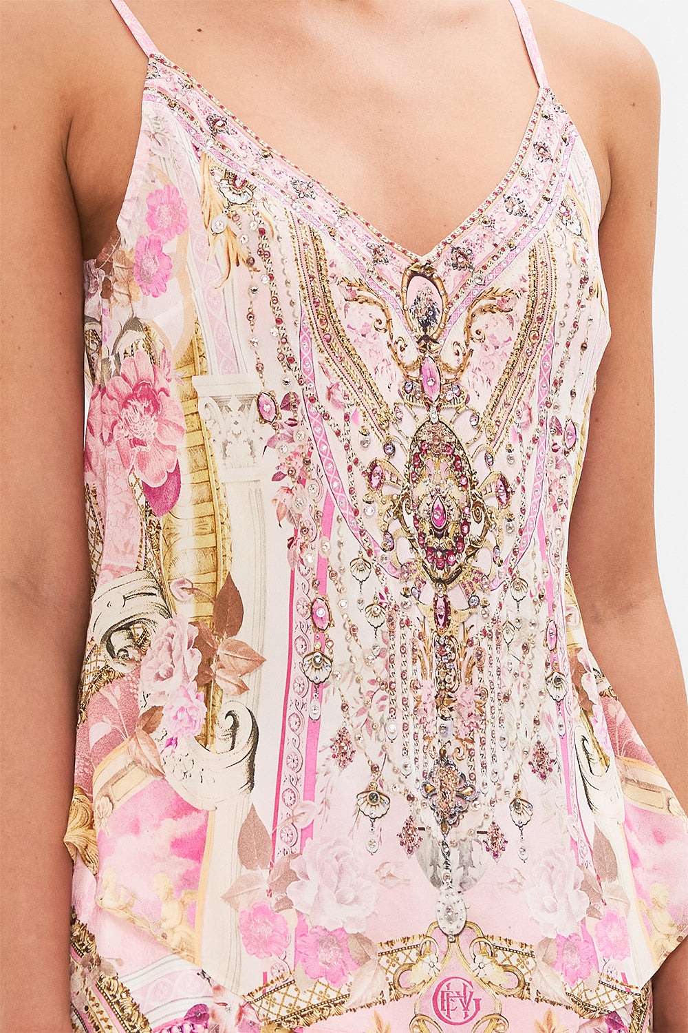Detail view of model wearing CAMILLA silk cami in Fresco Fairytale print