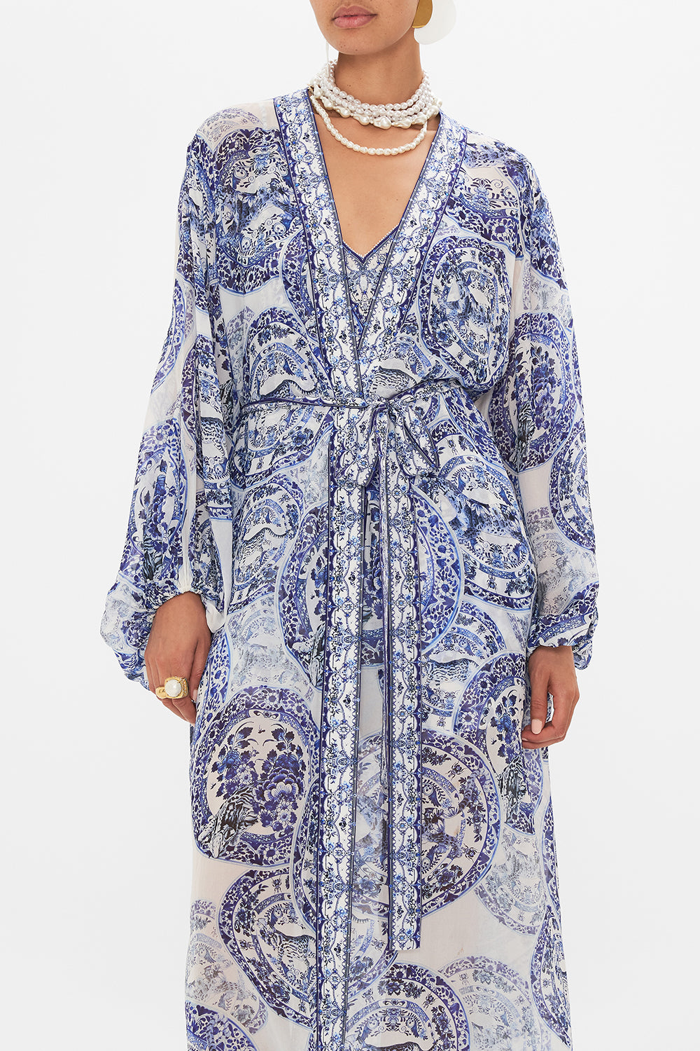 Crop view of model wearing CAMILLA silk layer in Glaze and Graze print 