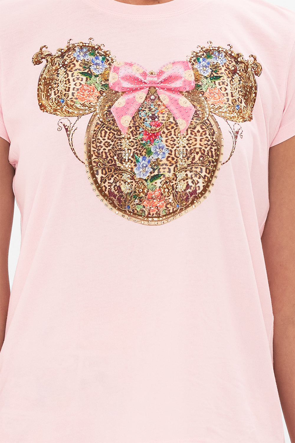 Detail view of model wearing Disney x CAMILLA pink t shirt in Minnie Mouse Magic print