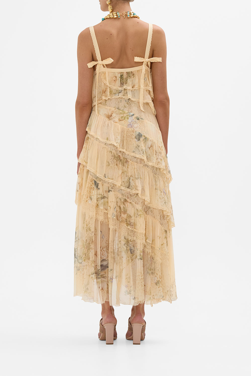 ASYMMETRIC SPLICED LACE DRESS ADORNED IN ANTIQUITY