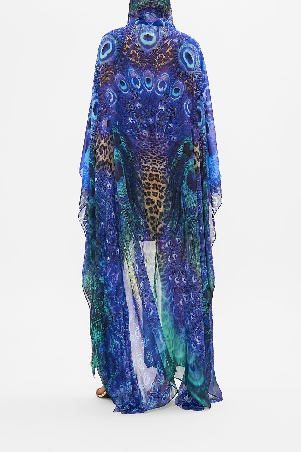 Back view of model wearing CAMILLA silk robe in Peacock Rock print