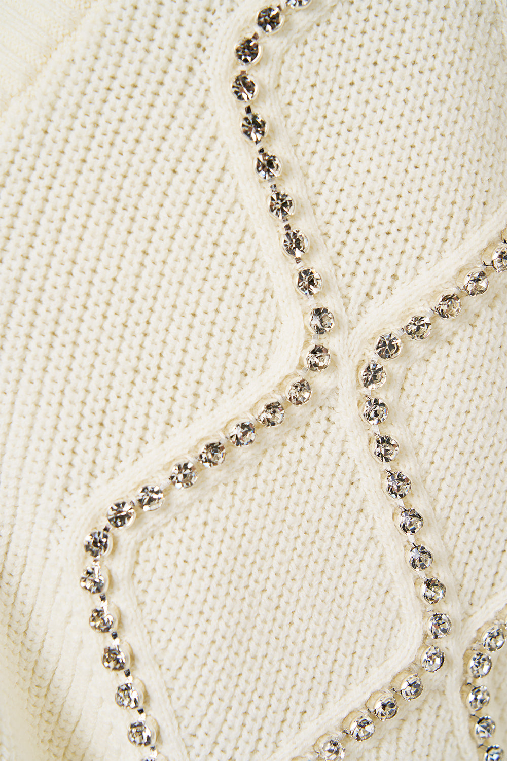 The CAMILLA CROPPED KNIT CARDIGAN THE QUEENS QUARTERS