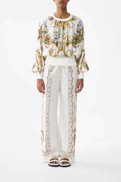 The CAMILLA Bias Cut Drawstring Pant in our Dressing Room Drama print.