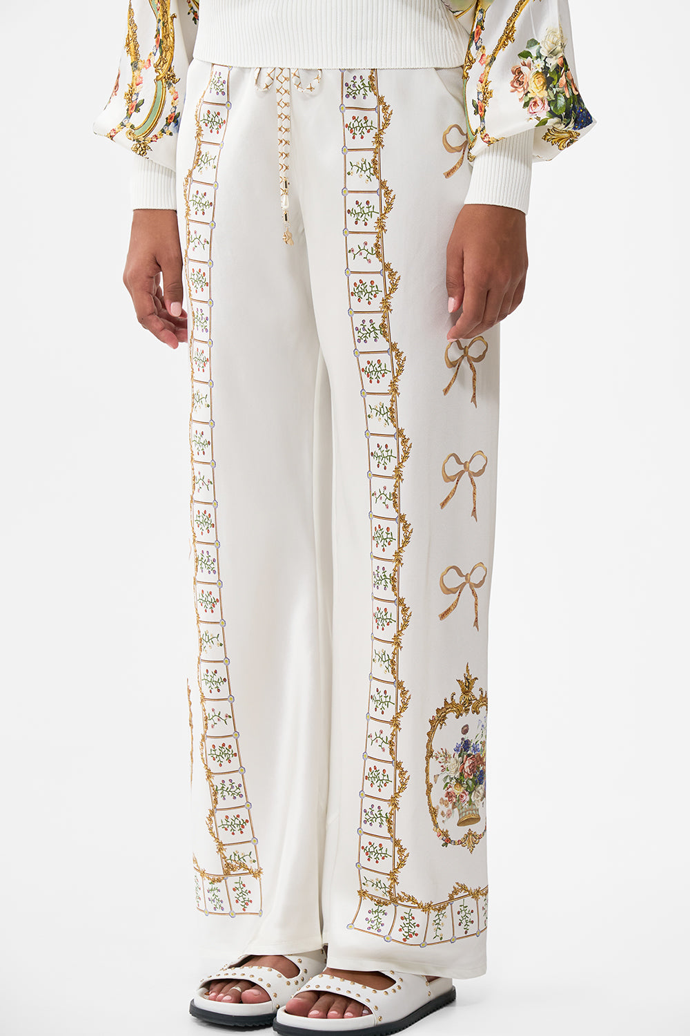 The CAMILLA Bias Cut Drawstring Pant in our Dressing Room Drama print.