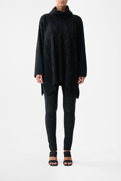 The CAMILLA Roll Neck Knit Jumper in our Solid Black print.