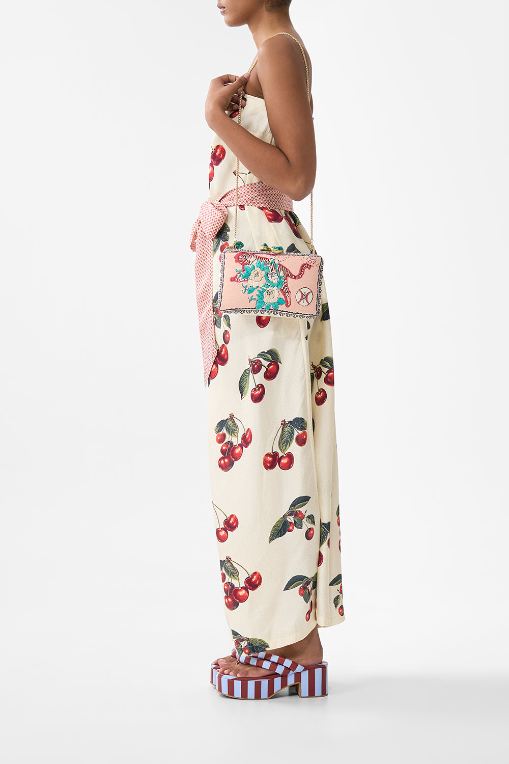 HARDCASE CLUTCH WITH RAFFIA DETAIL NOTES FROM THE ROAD