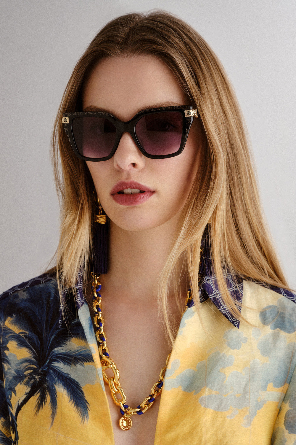 The CAMILLA HERE COMES TROUBLE SUNGLASSES BLACK / GOLD LEOPARD GLITTER