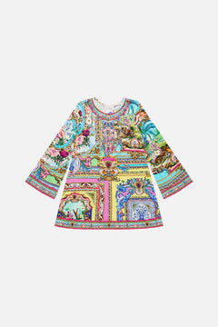 The CAMILLA Kids Flare Long Sleeve Tee Mini Dress 4-10 in our Spirit Of Santa Maria print.