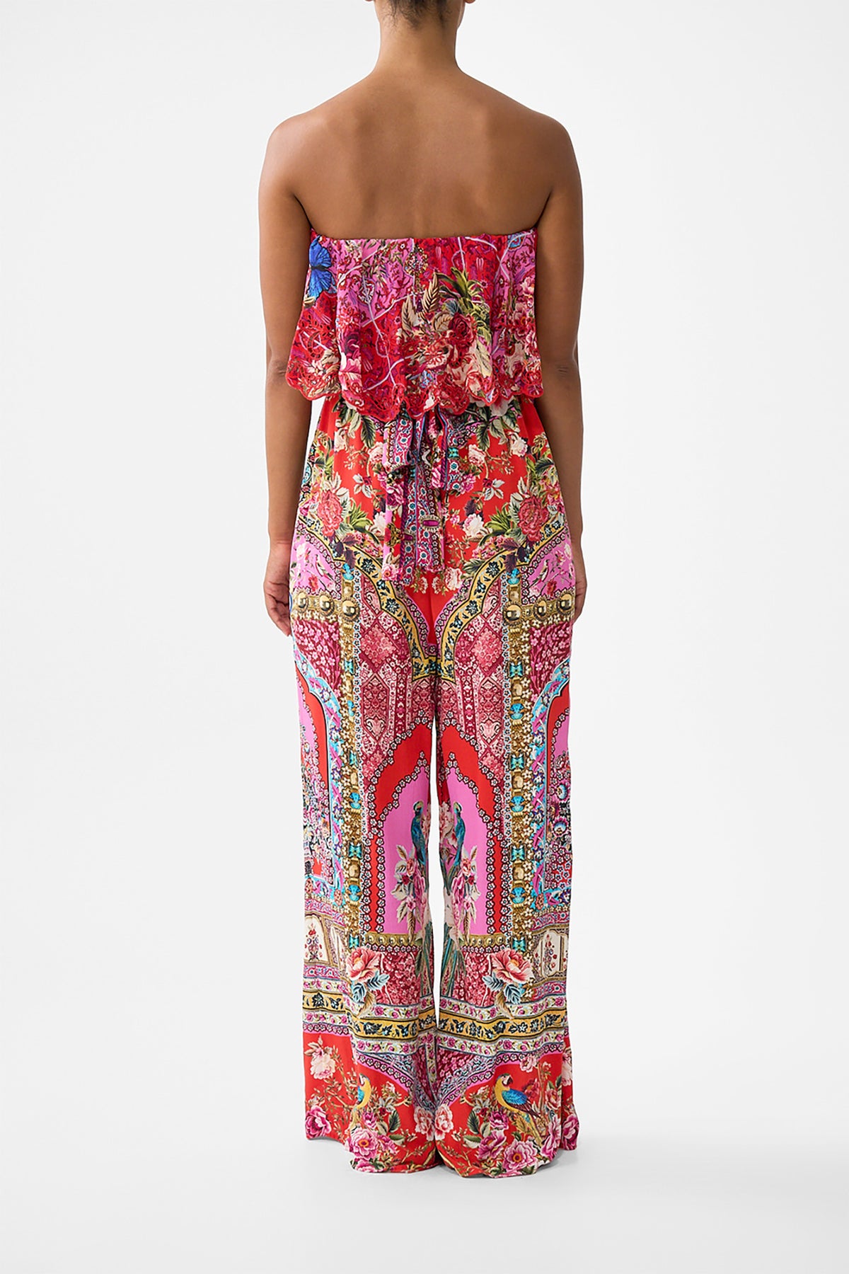 The CAMILLA STRAPLESS JUMPSUIT WITH FRILL HEIRLOOM EMPIRE