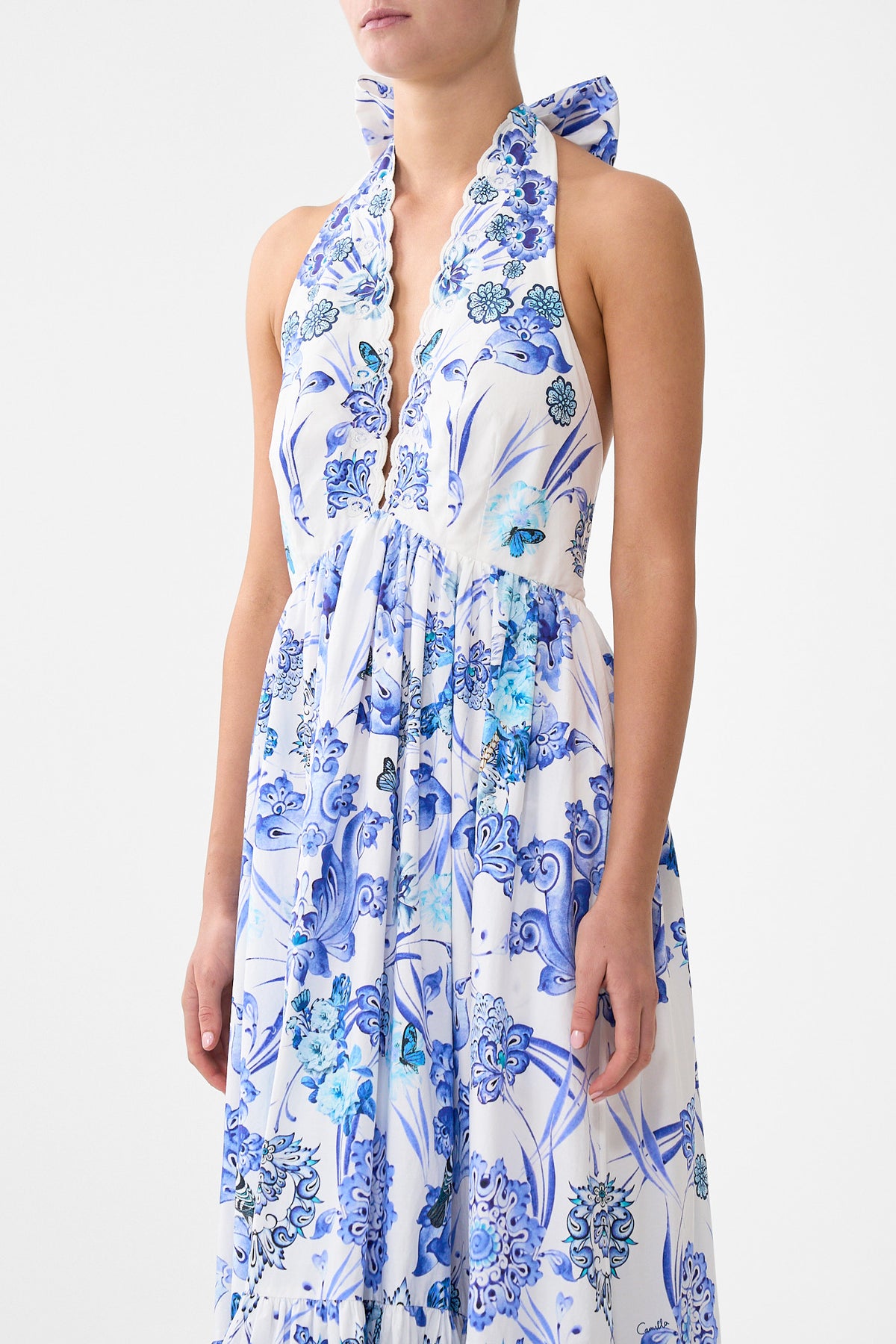 The CAMILLA RUFFLE HEM HALTER DRESS ALL ABOUT THAT LACE