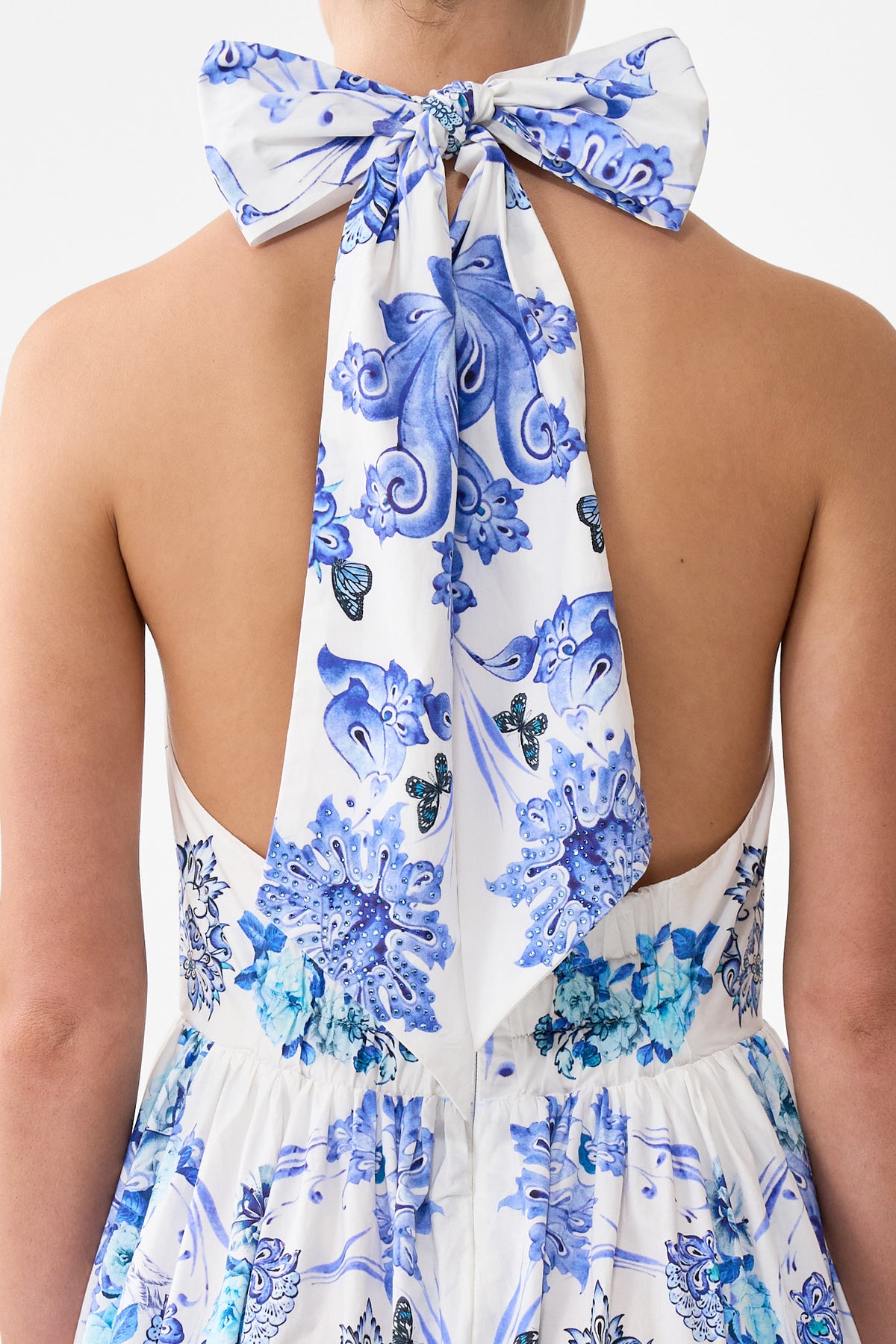 The CAMILLA RUFFLE HEM HALTER DRESS ALL ABOUT THAT LACE