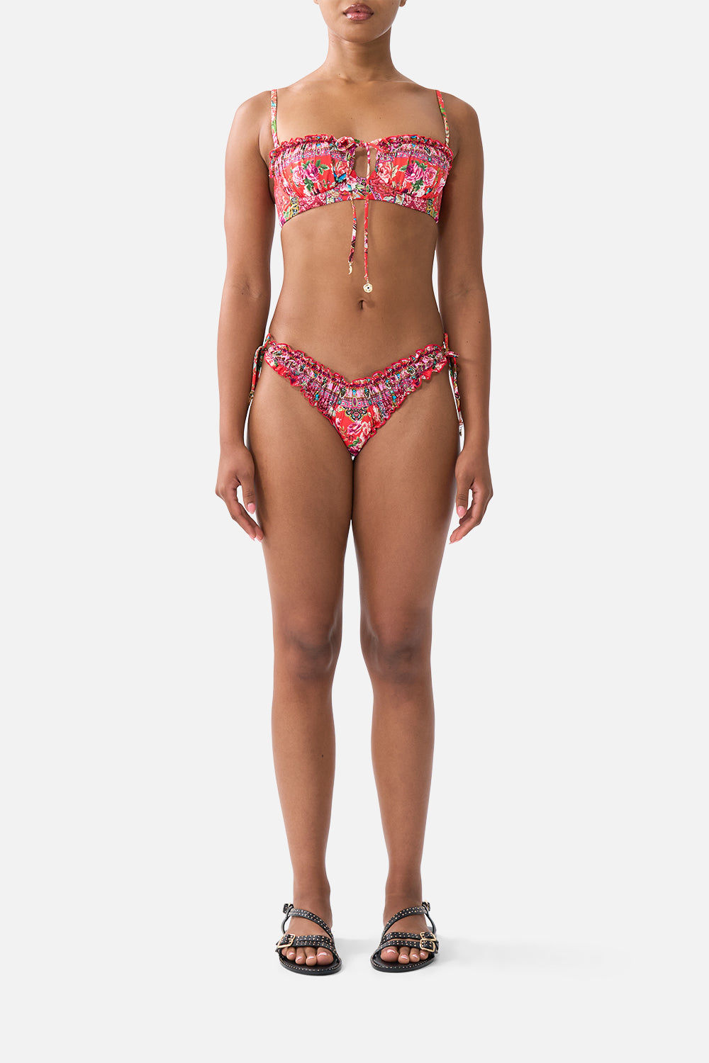 The CAMILLA RUCHED SKIMPY BIKINI BOTTOM WITH TIE SIDES HEIRLOOM EMPIREHEIRLOOM EMPIRE