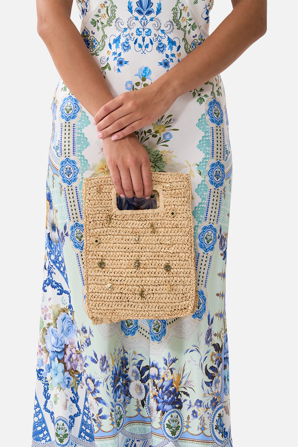 The CAMILLA RAFFIA MINI NORTH SOUTH TOTE WITH CHARMS NATURAL